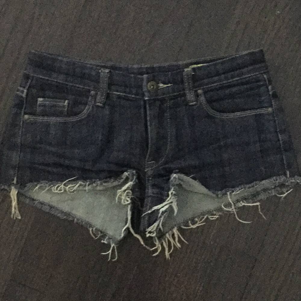 Blank denim shorts with studs on pockets